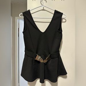 Peplum sleeveless blouse with gold buckle belt